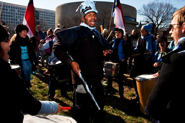 Cackalacky Thunder Drum Major Edward Goins warms up the crowd during an anti-war demonstration in Washington D.C., Saturday, Jan. 27, 2007.